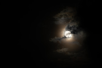 Wall Mural - Moon light behind cloud