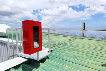 Wall Mural - Fire Extinguisher Cabinet of Solar Rooftop System