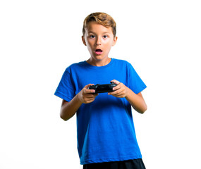 Canvas Print - A full-length shot of Kid playing the console on isolated white background