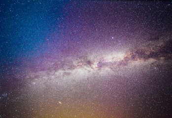 Wall Mural - colorful space shot showing the universe milky way galaxy with stars and space dust.
