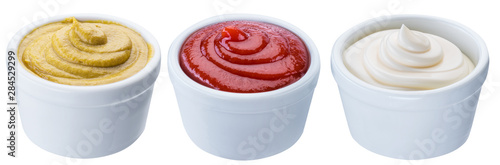 Fotografía Mayonnaise, mustard and tomato sauces in white bowls