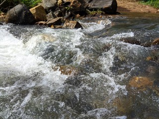 water flowing over rocks