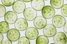 Fresh Cucumber Slices On A White Background