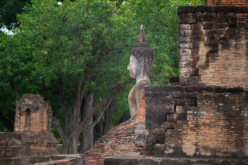 Wall Mural - Beautiful ancient buddha at Sukhothai Historical Park ,Sukhothai ,Thailand