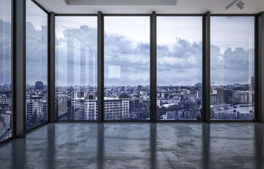 City rooftops viewed through wraparound windows