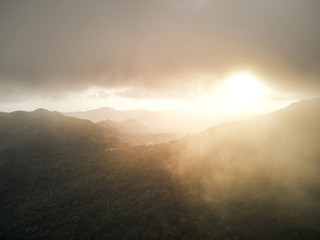 Poster - Foggy sunset over mountain