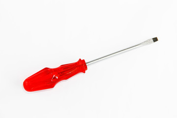 old rusty metal screwdriver for screws with red handle