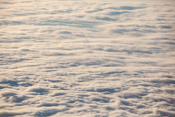 Wall Mural - Beautiful view above the clouds on sunset. Gomismta, Georgia.