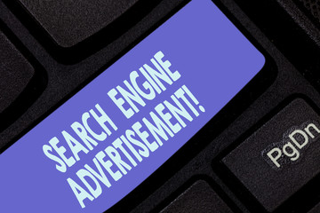 Handwriting text writing Search Engine Advertisement. Concept meaning Placing online advertisements on webpages Keyboard key Intention to create computer message pressing keypad idea