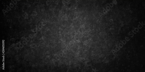 Cuadros en Lienzo Black grunge texture on old background in distressed vintage design with a grungy rough surface in an elegant classy background with soft lit center and dark borders