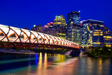 Calgary Downtown with the Peace bridge with the skyline on the background during