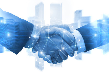 Wall Mural - Partnership - business man shaking hands with effect digital network link connection graphic diagram, digital global technology with cityscape background, internet communication and teamwork concept