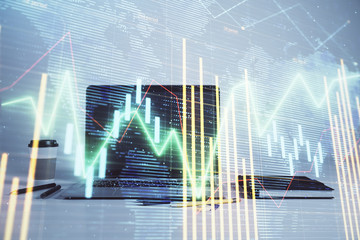 Stock market chart with globe hologram and desktop office computer background. Multi exposure. Concept of financial analysis.