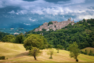 Wall Mural - Urbino, Italy - Scenic View of the Hillside Area and the Historic Town of Urbino (UNESCO World Heritage)