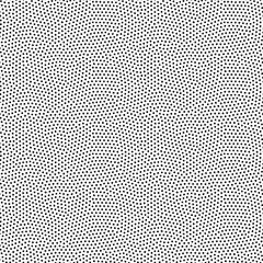 Seamless dot pattern with randomly disposed spots. Dotted background. Black and white vector trendy texture.