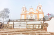 Historic church in foggy city in Tiradentes, Minas Gerais, Brazil. Fog in historic center.