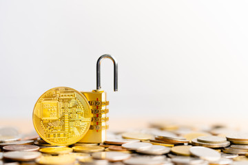 Bitcoin(BTC) coin with padlock lying on coins stack. Bitcoin security. digital cyber safety or security encryption, Blockchain technology to encode online information or data protection.