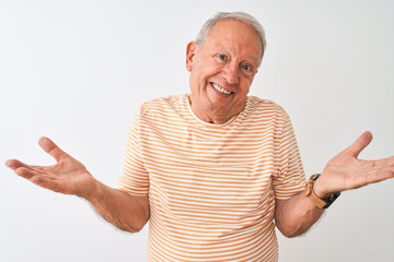 Poster - senior grey-haired man wearing striped t-shirt standing over isolated white background smiling cheer