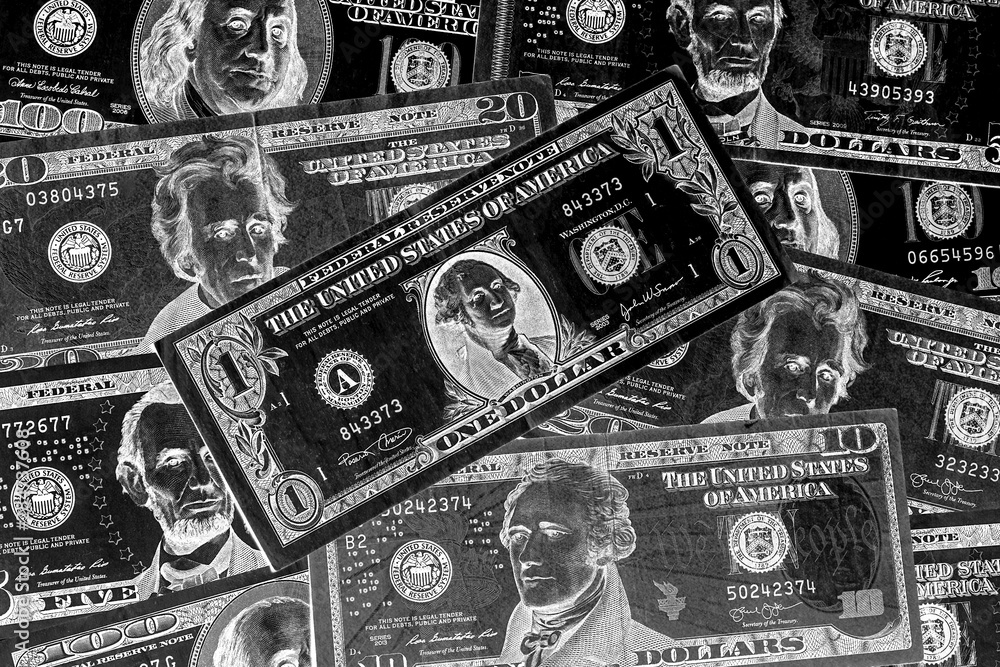 USA dollars of varying nominal values. Texture of multiple US dollar ...