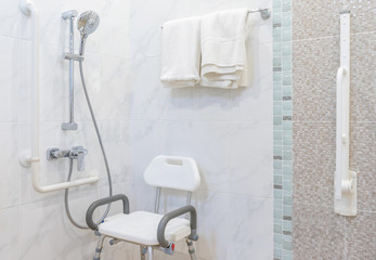 Interior of bathroom for the disabled or elderly people. Handrail for disabled and elderly people in the bathroom