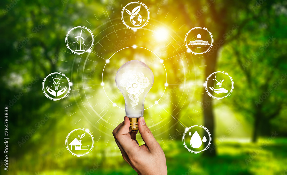 Green energy innovation light bulb with future industry of power generation icon graphic interface. Concept of sustainability development by alternative energy. - obrazy, fototapety, plakaty 