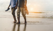 Couple senior elder retire resting relax walking at sunset beach honeymoon family together happiness people lifestyle