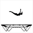 Silhouette of a woman doing front drop on a trampoline