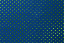 Navy Blue Background From Metal Foil Paper With A Golden Green Stars Pattern.