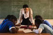 © Wavebreak Media - Female teacher and young pupils working in class