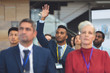 © WavebreakMediaMicro - Young businessman raising hand in a business seminar