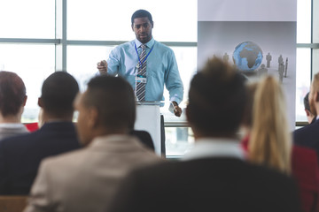 Wall Mural - Male speaker speaks in a business seminar