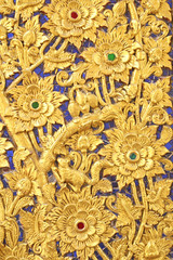 Wall Mural - Golden stucco sculpture in Thai temples