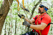 © Astarot - Mountain rescuer securing ropes to climb