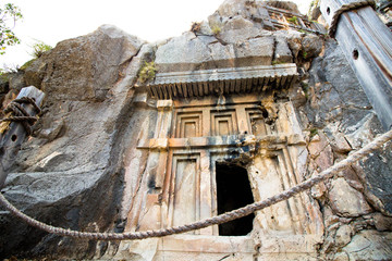 Entrance to the tomb of ancient civilization. Tombs are carved into the rocks on the territory of modern Turkey.