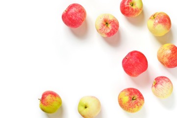 Wall Mural - Ripe red apples on a white background