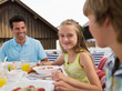 © Westend61 - Family at breakfast table