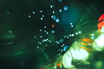 Aufkleber - Beautiful abstract fiber optic network cable on a green bokeh colored glow background.