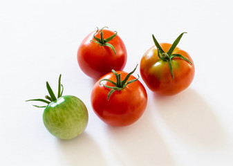 small cherry tomatoes on white background