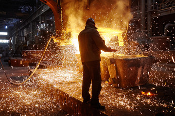 Wall Mural - Steelmaker at ingot casting. Electric arc furnace shop EAF. Metallurgy.