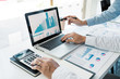 © snowing12 - Business People Talking Discussing with coworker planning analyzing financial document data charts and graphs in Meeting and  successful teamwork Concept.