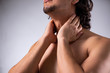© Elnur - Young man suffering from neck pain