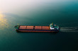 © alexmina - Shipping cargo to harbor by ship. Water transport International. Aerial view