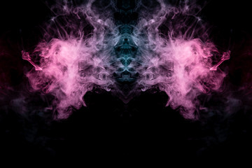 Wall Mural - Smoke of different blue, red and pink colors in form of horror in the shape of the head, face and eye with wings on a black isolated background. Soul and ghost in mystical symbol. Print for clothes.