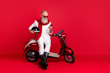 Aged Macho Man Sit On Retro Moped Chatting Telephone Wear Jumper And Trousers Isolated Red Background