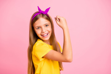 Poster - Close-up portrait of her she nice attractive lovely winsome cheerful cheery confident pre-teen girl wearing yellow t-shirt celebrating attainment isolated over pink pastel background