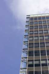 Modern office glasses buildings cityscape under blue clear sky.