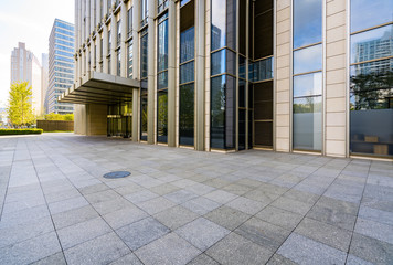 Fototapete - Empty floors and office buildings in the financial center, Qingdao, China