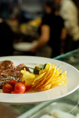 Wall Mural - steak, fried potatoes, tomatoes and green pepper