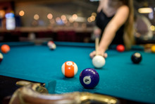 Selective Focus At Billiard Ball On Blue Table