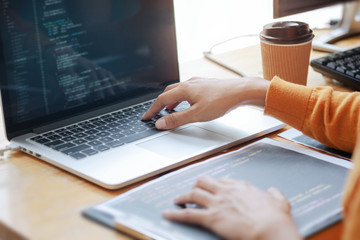 young programmer working with data code in software development company office.